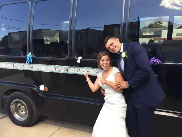 Limo Party Bus: Our black limo party bus at a wedding