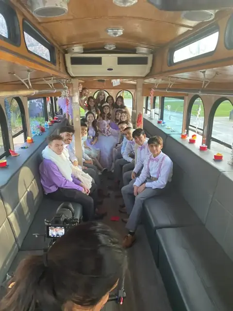 Trolley Limo Bus: Limo-style seating inside the trolley